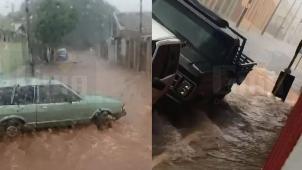 Veculos so arrastados por enxurrada durante chuva forte em Tup